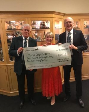 John O'Connor presenting cheque
