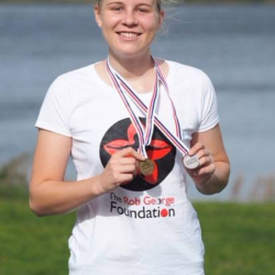 RGF Grantee Miriam showing medals