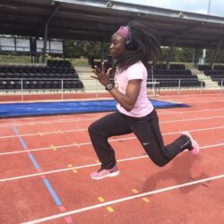 Leanza sprinting on running track