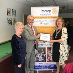 The photo shows Anne and fellow Rotarian, Jenny Black, with David