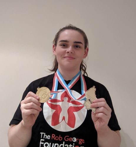 Ashley Lewis with medals
