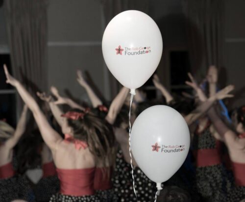 RGF balloons in a crowded room