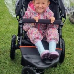 Arabella in her new comfy pram.