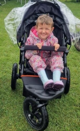 Arabella in her new comfy pram.